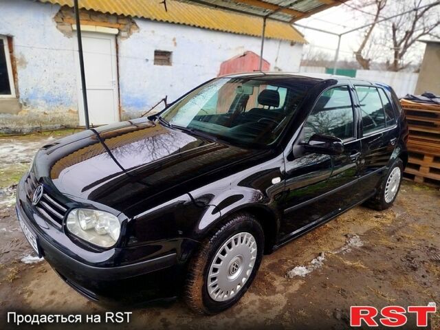 Черный Фольксваген Гольф, объемом двигателя 1.6 л и пробегом 218 тыс. км за 4400 $, фото 1 на Automoto.ua