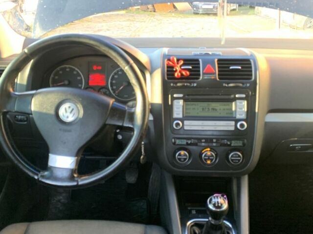 Черный Фольксваген Гольф, объемом двигателя 1.4 л и пробегом 222 тыс. км за 5700 $, фото 1 на Automoto.ua