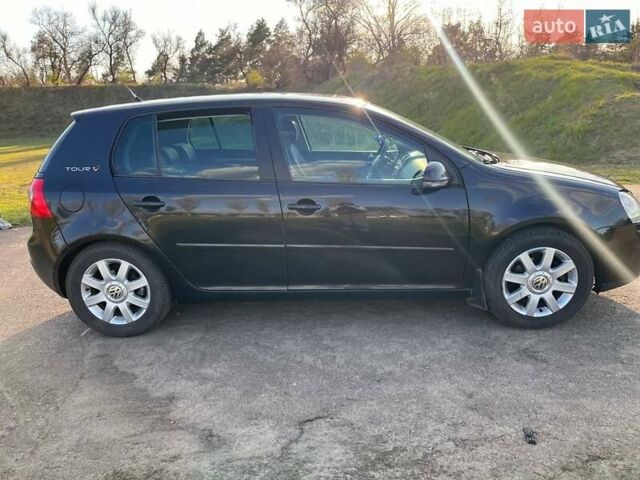 Черный Фольксваген Гольф, объемом двигателя 1.6 л и пробегом 183 тыс. км за 6550 $, фото 1 на Automoto.ua