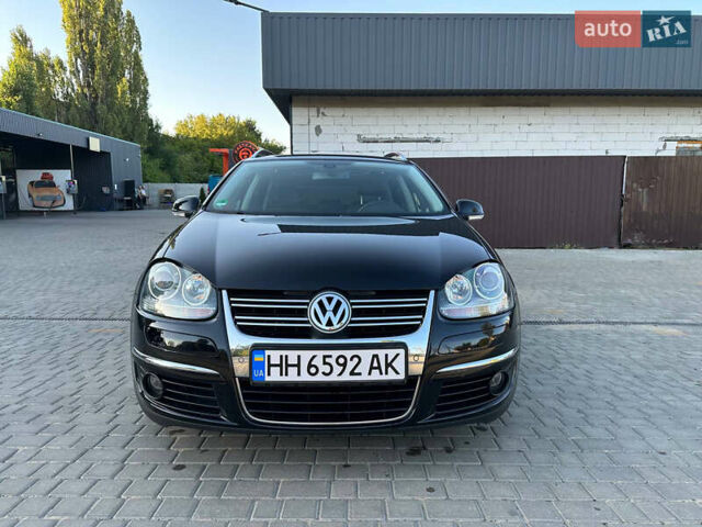 Черный Фольксваген Гольф, объемом двигателя 1.4 л и пробегом 148 тыс. км за 7800 $, фото 1 на Automoto.ua
