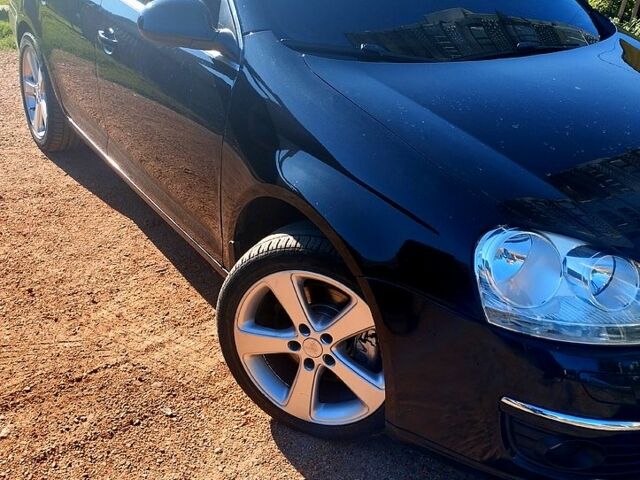 Черный Фольксваген Гольф, объемом двигателя 1.4 л и пробегом 247 тыс. км за 5800 $, фото 1 на Automoto.ua