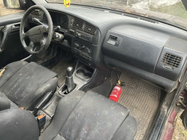 Красный Фольксваген Гольф, объемом двигателя 1.8 л и пробегом 380 тыс. км за 700 $, фото 1 на Automoto.ua