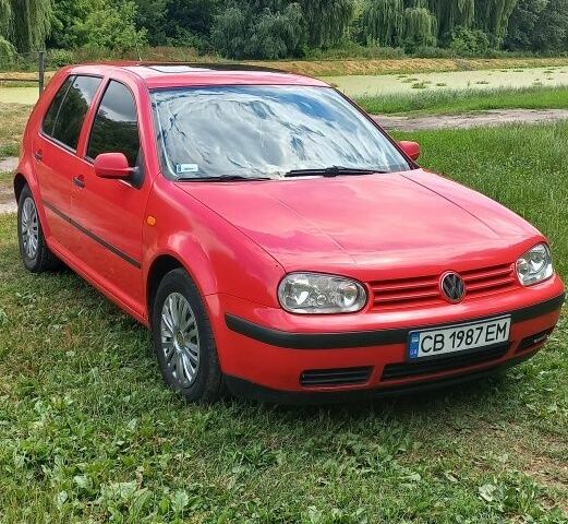 Красный Фольксваген Гольф, объемом двигателя 1.4 л и пробегом 350 тыс. км за 3598 $, фото 1 на Automoto.ua