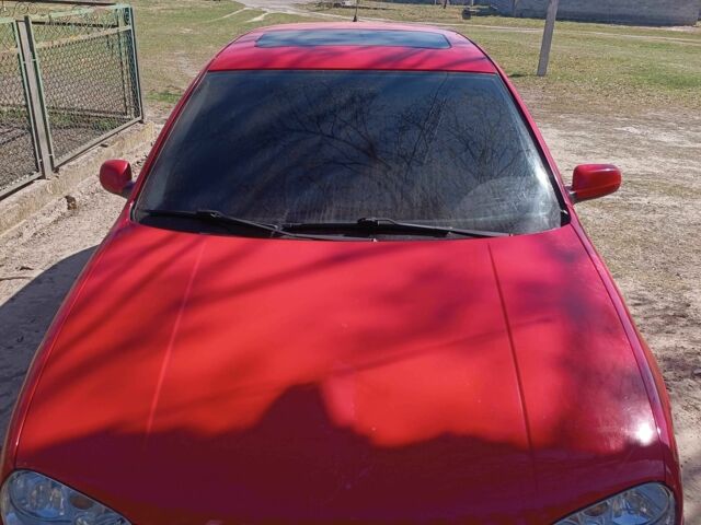 Красный Фольксваген Гольф, объемом двигателя 1.4 л и пробегом 292 тыс. км за 2250 $, фото 1 на Automoto.ua