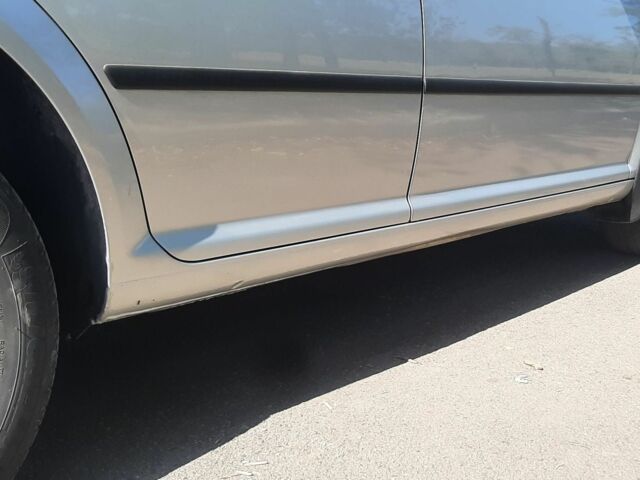 Сірий Фольксваген Гольф, об'ємом двигуна 1.6 л та пробігом 243 тис. км за 5300 $, фото 1 на Automoto.ua