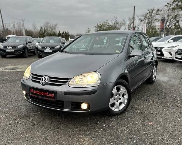 Серый Фольксваген Гольф, объемом двигателя 1.4 л и пробегом 233 тыс. км за 6750 $, фото 1 на Automoto.ua