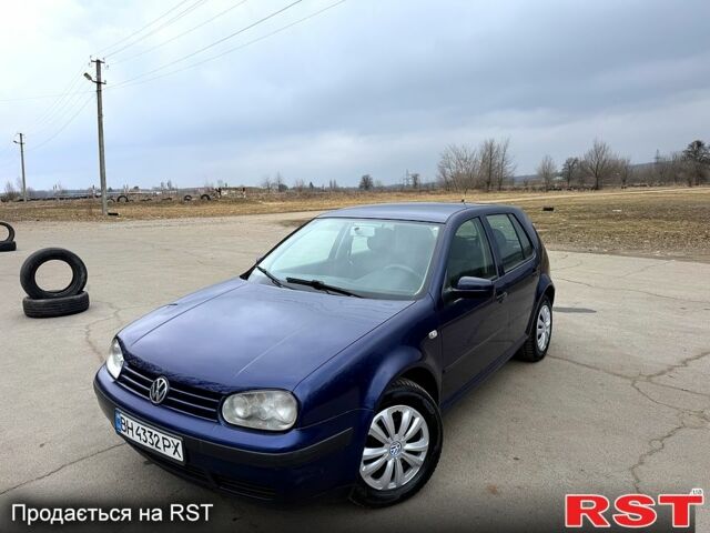 Синий Фольксваген Гольф, объемом двигателя 1.4 л и пробегом 216 тыс. км за 3800 $, фото 1 на Automoto.ua