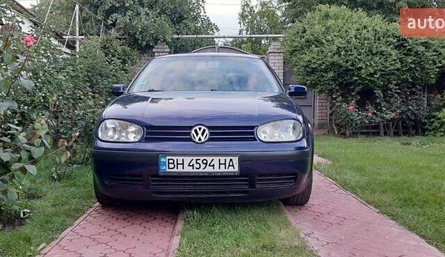 Синий Фольксваген Гольф, объемом двигателя 1.39 л и пробегом 244 тыс. км за 4400 $, фото 1 на Automoto.ua