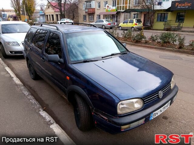 Синий Фольксваген Гольф, объемом двигателя 1.8 л и пробегом 200 тыс. км за 2400 $, фото 1 на Automoto.ua