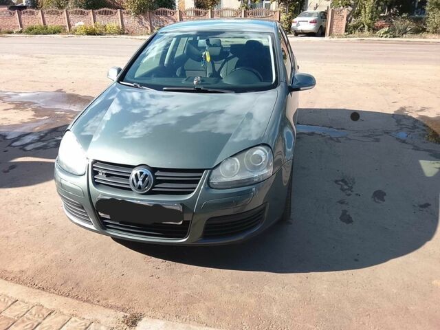 Зеленый Фольксваген Гольф, объемом двигателя 1.4 л и пробегом 253 тыс. км за 6000 $, фото 1 на Automoto.ua