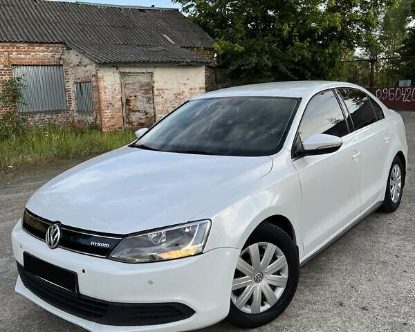 Білий Фольксваген Джетта, об'ємом двигуна 1.39 л та пробігом 128 тис. км за 9400 $, фото 1 на Automoto.ua