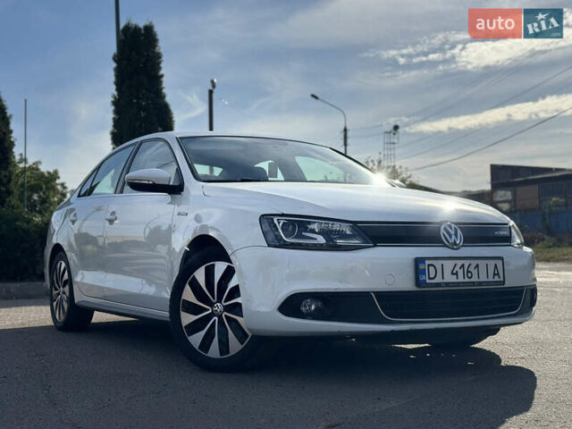 Білий Фольксваген Джетта, об'ємом двигуна 1.39 л та пробігом 186 тис. км за 10800 $, фото 1 на Automoto.ua