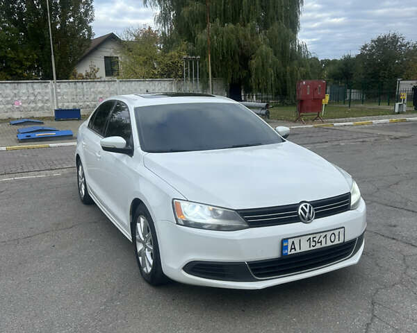 Фольксваген Джетта 2014 в Василькове на Automoto.ua Белый Фольксваген Джетта, объемом двигателя 1.8 л и пробегом 198 тыс. км за 10500 $, фото 1 на Automoto.ua