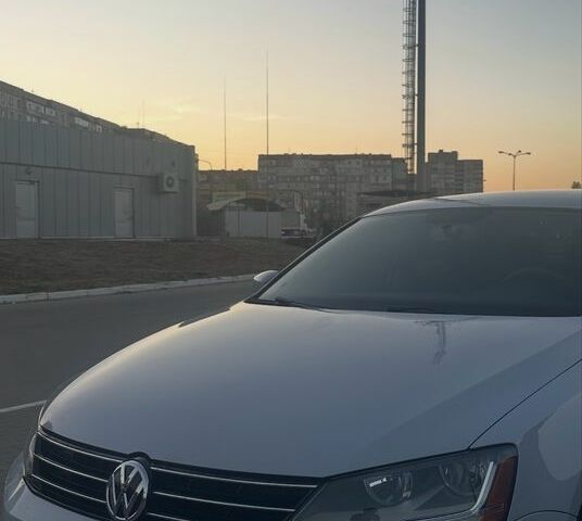 Белый Фольксваген Джетта, объемом двигателя 1.4 л и пробегом 69 тыс. км за 11900 $, фото 1 на Automoto.ua