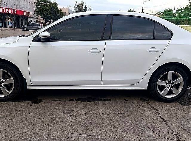 Білий Фольксваген Джетта, об'ємом двигуна 1.6 л та пробігом 165 тис. км за 12750 $, фото 1 на Automoto.ua