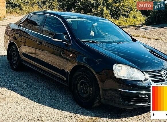 Черный Фольксваген Джетта, объемом двигателя 1.4 л и пробегом 250 тыс. км за 5000 $, фото 1 на Automoto.ua