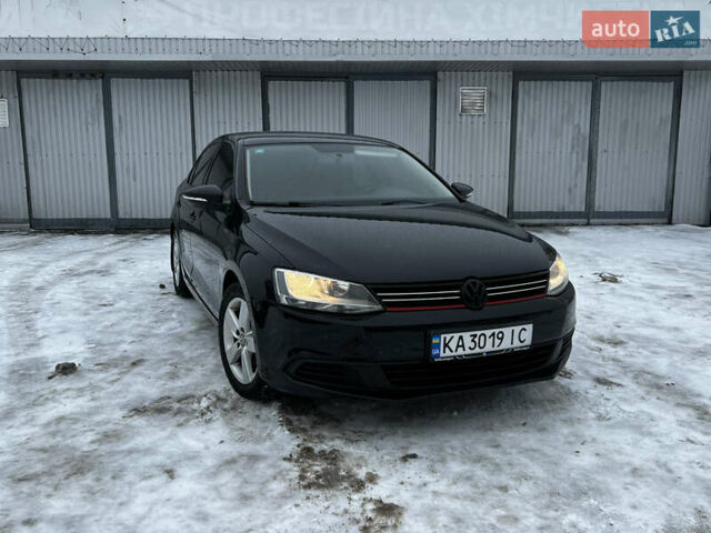 Чорний Фольксваген Джетта, об'ємом двигуна 1.2 л та пробігом 165 тис. км за 6989 $, фото 1 на Automoto.ua