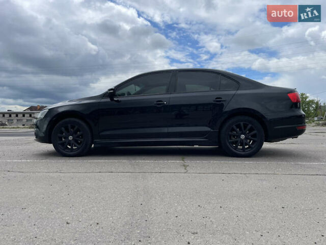 Чорний Фольксваген Джетта, об'ємом двигуна 1.39 л та пробігом 199 тис. км за 8499 $, фото 1 на Automoto.ua