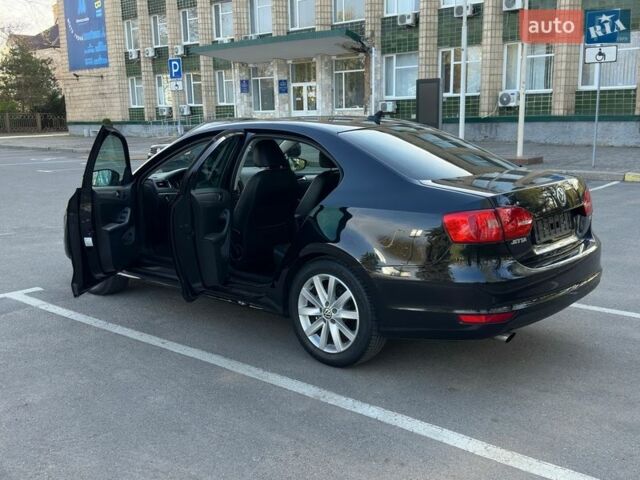 Черный Фольксваген Джетта, объемом двигателя 1.6 л и пробегом 208 тыс. км за 9600 $, фото 1 на Automoto.ua