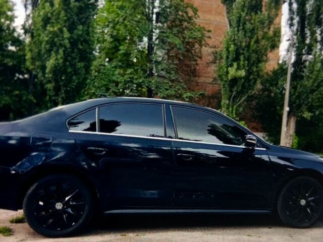 Черный Фольксваген Джетта, объемом двигателя 1.4 л и пробегом 189 тыс. км за 6999 $, фото 1 на Automoto.ua