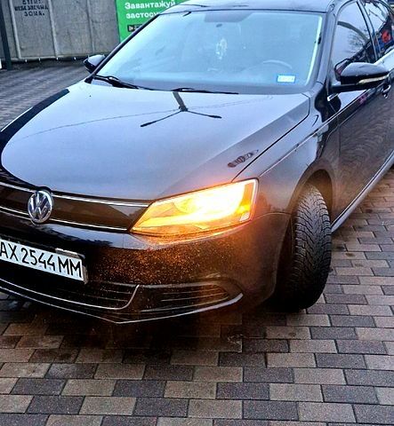 Чорний Фольксваген Джетта, об'ємом двигуна 1.4 л та пробігом 241 тис. км за 8599 $, фото 1 на Automoto.ua