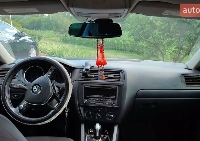 Чорний Фольксваген Джетта, об'ємом двигуна 2 л та пробігом 198 тис. км за 10400 $, фото 1 на Automoto.ua