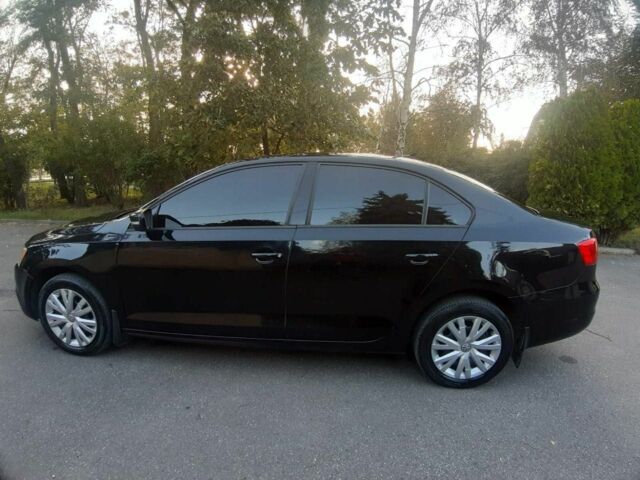 Черный Фольксваген Джетта, объемом двигателя 1.8 л и пробегом 155 тыс. км за 9200 $, фото 1 на Automoto.ua