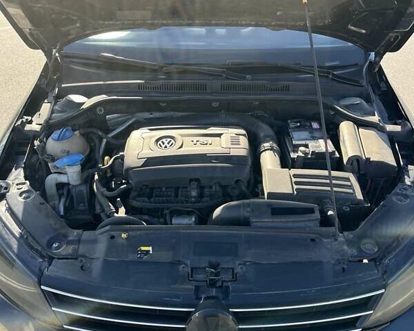 Фольксваген Джетта 2015 в Хмельницком на Automoto.ua Черный Фольксваген Джетта, объемом двигателя 1.8 л и пробегом 147 тыс. км за 9000 $, фото 1 на Automoto.ua