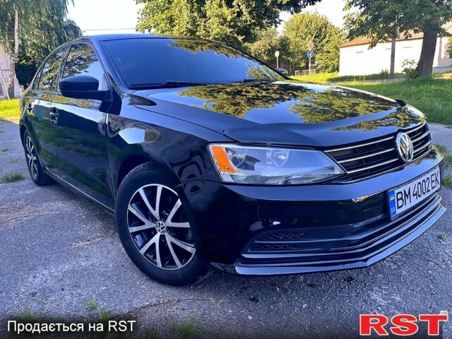 Черный Фольксваген Джетта, объемом двигателя 1.4 л и пробегом 69 тыс. км за 8499 $, фото 1 на Automoto.ua