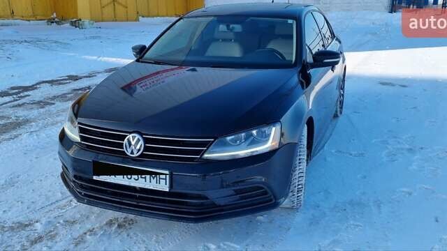Черный Фольксваген Джетта, объемом двигателя 1.4 л и пробегом 115 тыс. км за 10900 $, фото 1 на Automoto.ua