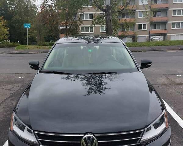 Чорний Фольксваген Джетта, об'ємом двигуна 1.4 л та пробігом 105 тис. км за 10673 $, фото 1 на Automoto.ua