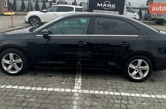Черный Фольксваген Джетта, объемом двигателя 1.6 л и пробегом 148 тыс. км за 13700 $, фото 1 на Automoto.ua