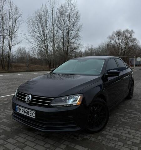 Черный Фольксваген Джетта, объемом двигателя 1.4 л и пробегом 74 тыс. км за 11500 $, фото 1 на Automoto.ua