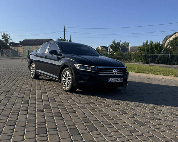 Чорний Фольксваген Джетта, об'ємом двигуна 1.4 л та пробігом 143 тис. км за 16700 $, фото 1 на Automoto.ua