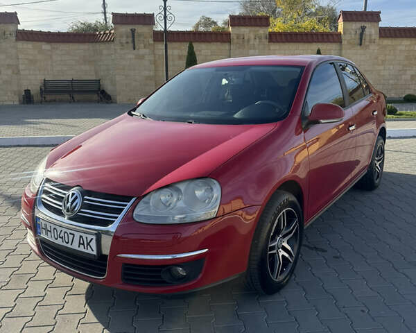 Красный Фольксваген Джетта, объемом двигателя 1.6 л и пробегом 125 тыс. км за 6000 $, фото 1 на Automoto.ua