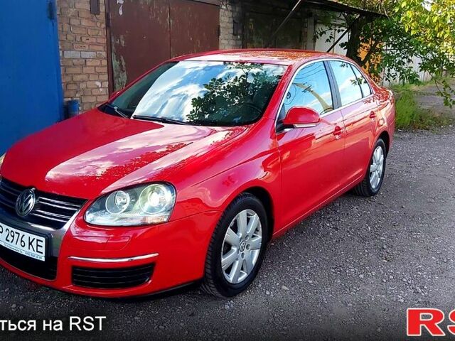 Красный Фольксваген Джетта, объемом двигателя 1.4 л и пробегом 198 тыс. км за 6000 $, фото 1 на Automoto.ua