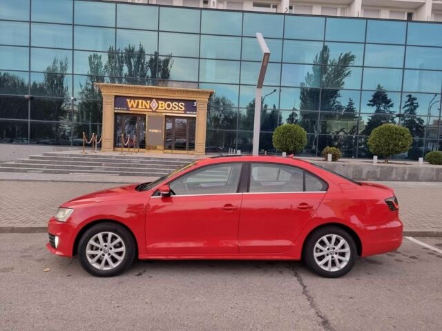 Красный Фольксваген Джетта, объемом двигателя 1.8 л и пробегом 94 тыс. км за 9000 $, фото 1 на Automoto.ua