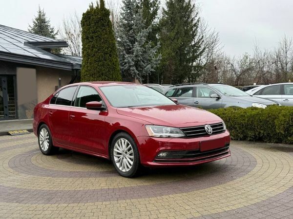 Червоний Фольксваген Джетта, об'ємом двигуна 1.4 л та пробігом 97 тис. км за 12300 $, фото 1 на Automoto.ua