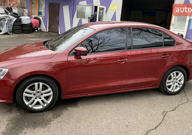 Червоний Фольксваген Джетта, об'ємом двигуна 1.4 л та пробігом 74 тис. км за 11499 $, фото 1 на Automoto.ua