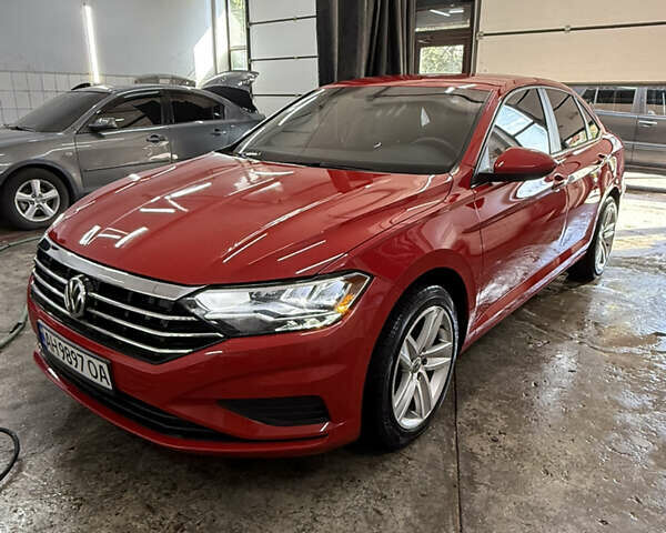 Червоний Фольксваген Джетта, об'ємом двигуна 1.39 л та пробігом 28 тис. км за 14999 $, фото 1 на Automoto.ua
