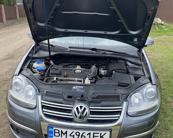 Серый Фольксваген Джетта, объемом двигателя 1.4 л и пробегом 240 тыс. км за 7200 $, фото 1 на Automoto.ua