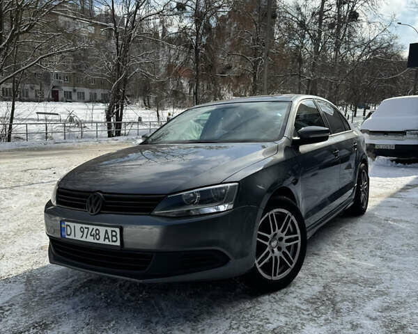 Серый Фольксваген Джетта, объемом двигателя 2.49 л и пробегом 228 тыс. км за 7699 $, фото 1 на Automoto.ua