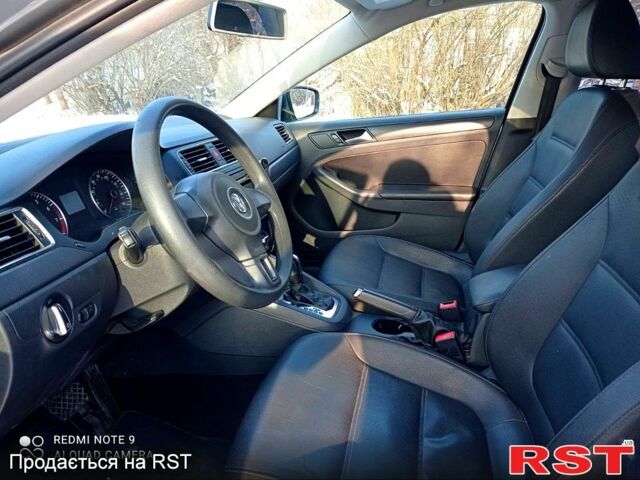 Серый Фольксваген Джетта, объемом двигателя 2.5 л и пробегом 27500 тыс. км за 8400 $, фото 1 на Automoto.ua