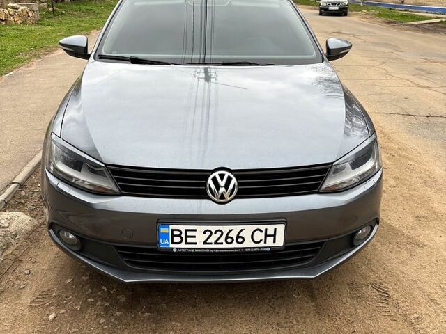 Серый Фольксваген Джетта, объемом двигателя 1.4 л и пробегом 220 тыс. км за 7800 $, фото 1 на Automoto.ua
