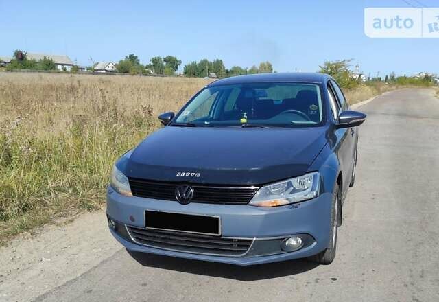 Серый Фольксваген Джетта, объемом двигателя 1.39 л и пробегом 180 тыс. км за 7300 $, фото 1 на Automoto.ua