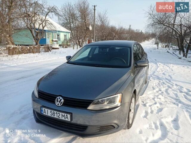 Серый Фольксваген Джетта, объемом двигателя 2.5 л и пробегом 275 тыс. км за 8400 $, фото 1 на Automoto.ua