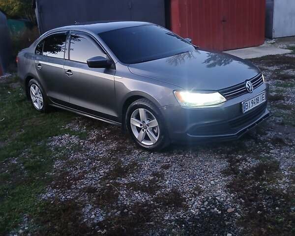 Сірий Фольксваген Джетта, об'ємом двигуна 2 л та пробігом 240 тис. км за 7850 $, фото 1 на Automoto.ua