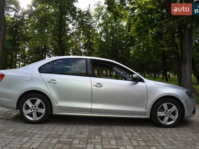 Серый Фольксваген Джетта, объемом двигателя 1.2 л и пробегом 201 тыс. км за 6500 $, фото 1 на Automoto.ua