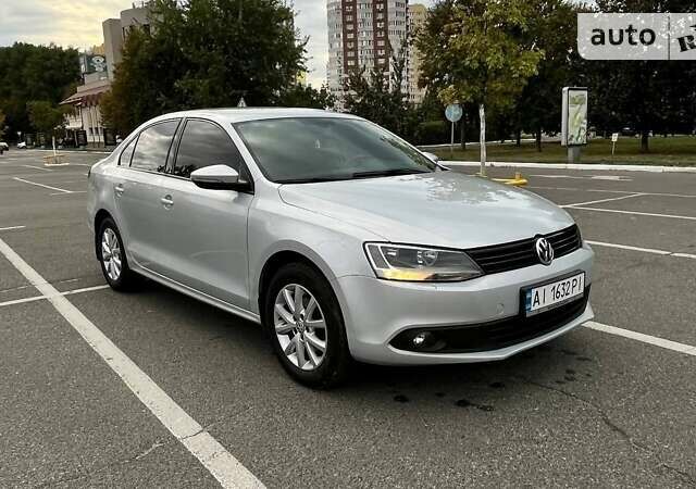 Сірий Фольксваген Джетта, об'ємом двигуна 1.4 л та пробігом 212 тис. км за 9300 $, фото 1 на Automoto.ua