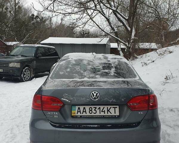 Серый Фольксваген Джетта, объемом двигателя 1.4 л и пробегом 90 тыс. км за 7800 $, фото 1 на Automoto.ua